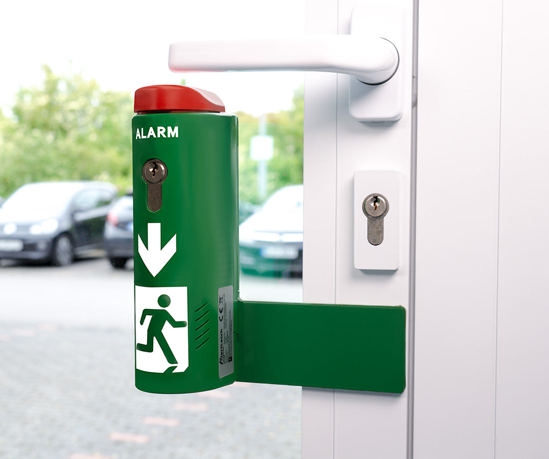 AlertLatch Einhand-Türwächter mit Voralarm sichert eine Glasrahmentür
